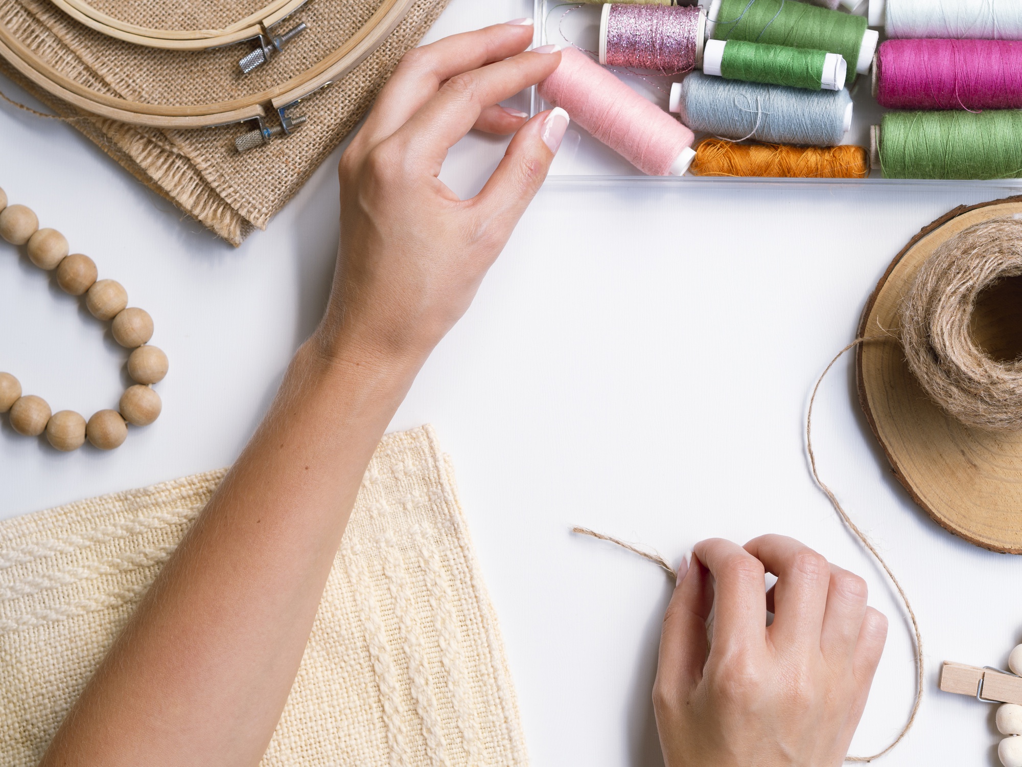 Artisan stitching in studio with natural light