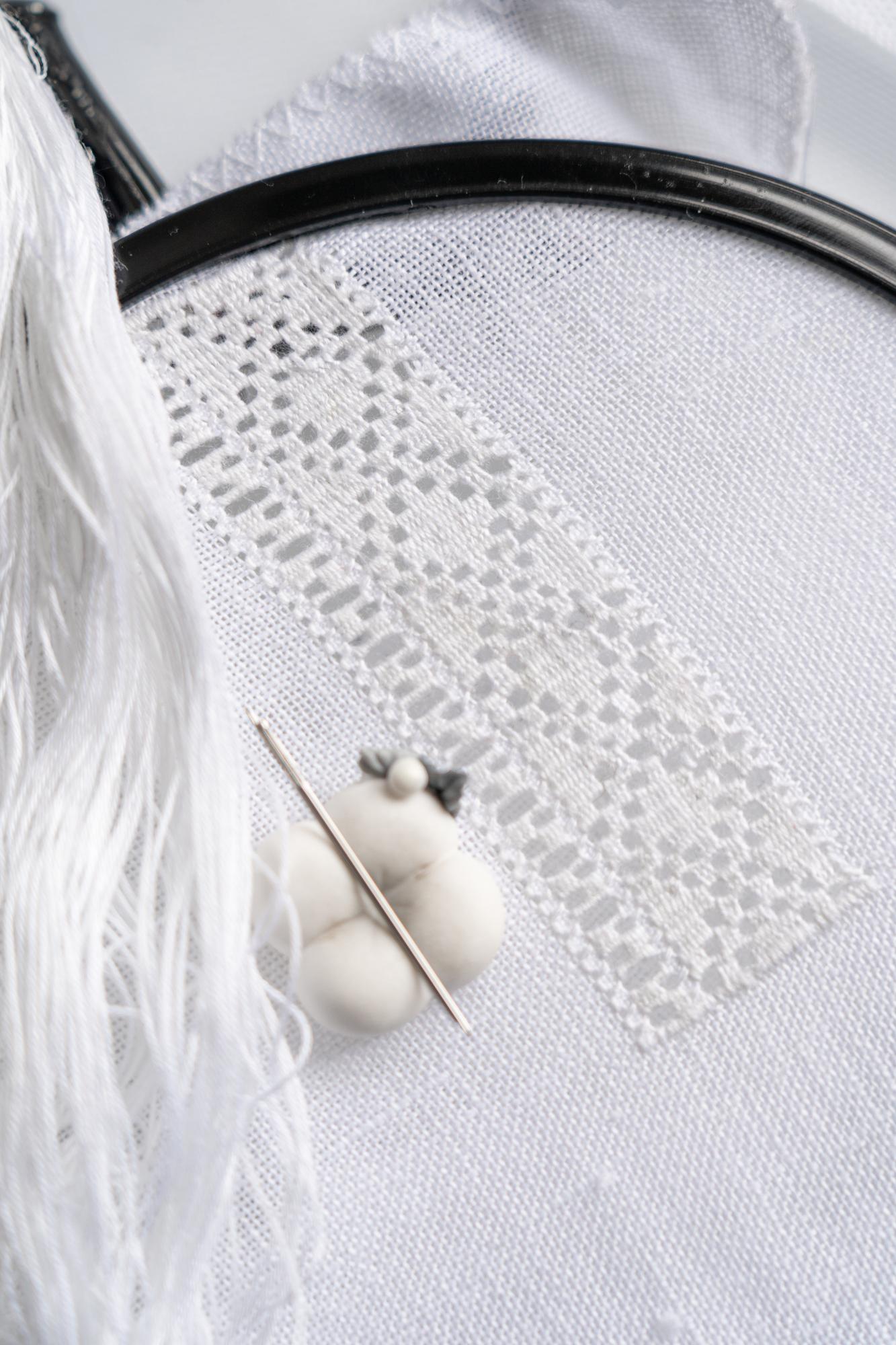 Same linen after careful embroidery restoration